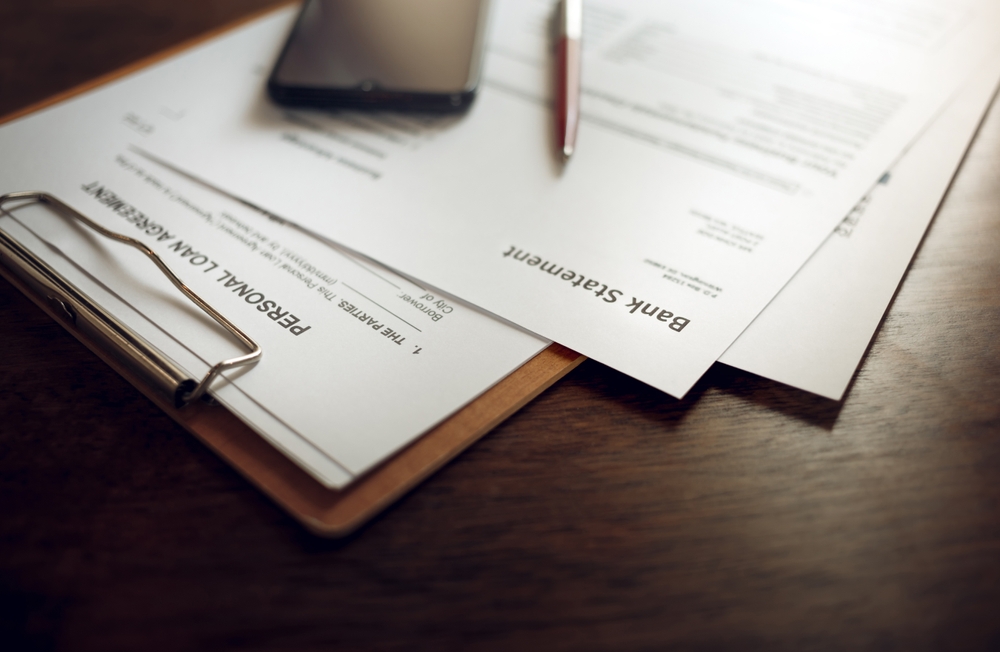 Personal,Loan,Document,With,Bank,Statement,,Mobile,Phone,And,Pen